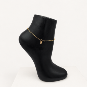 Delicate Gold Anklet on Black Mannequin Foot