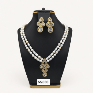 Elegant Gold Jewelry and Pearl Display