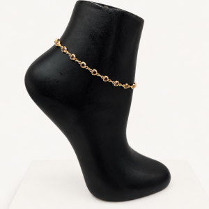 Gold Anklet on Black Display
