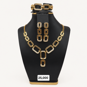 Gold Jewelry Set on Black Bust