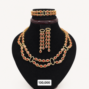 Ruby Gold Jewelry Set on Velvet Bust